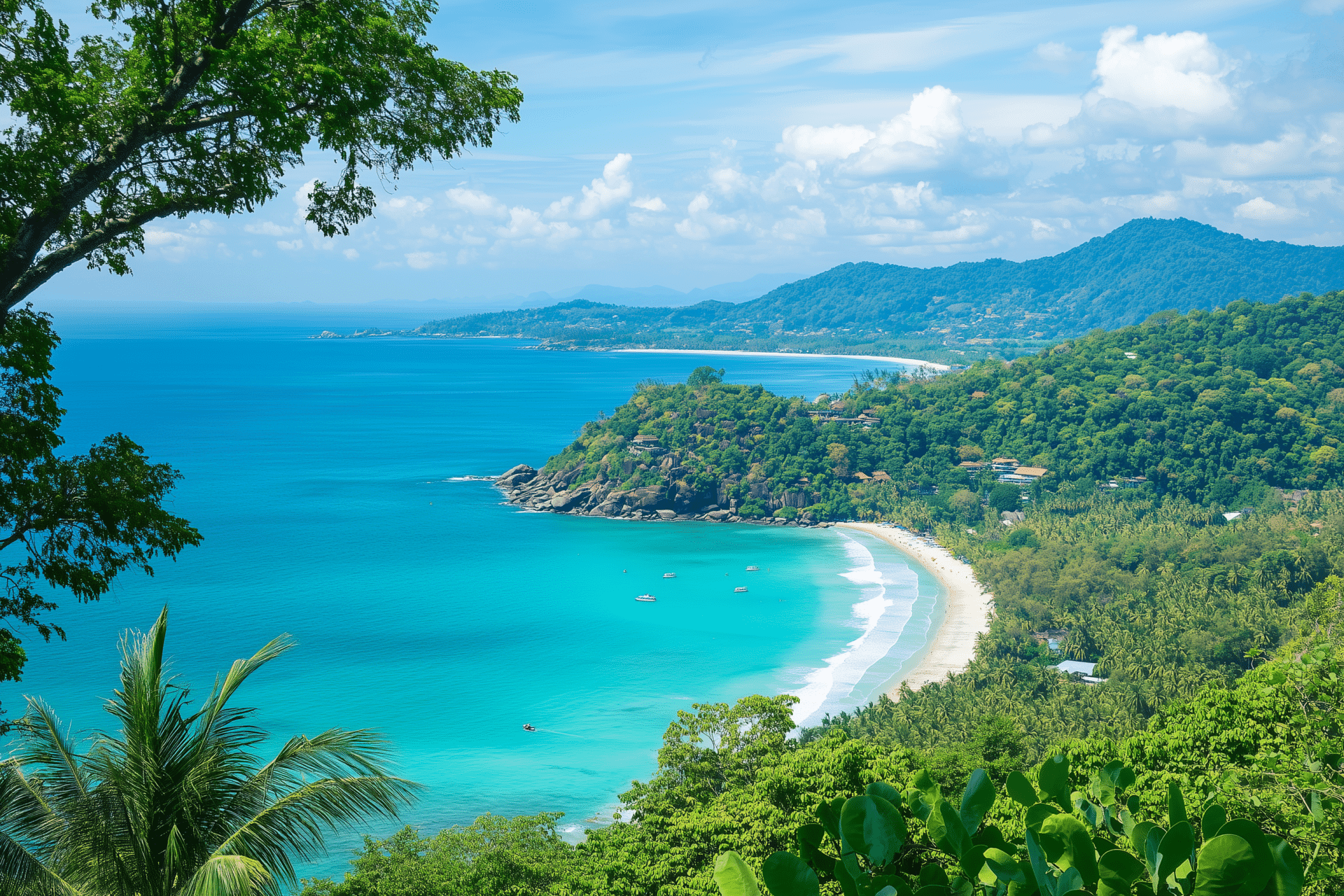 A scenic view of Phuket's tropical coastline with turquoise waters and a white sandy beach. Lush green hills surround the area, and a few boats dot the water. Under a bright sky scattered with fluffy clouds, its clear why many consider this paradise the best time to visit.